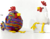 Completed Amigurumi chicken and rooster (white body with yellow/red accents, multi-coloured body with yellow/red accents)