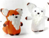 Completed Amigurumi foxes (white or orange with fuzzy white face and ears, brown feet and ear accents)