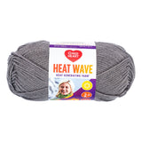 Ball of Red Heart Heat Wave yarn in shade radio (grey/purple)