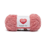Ball of Red Heart Hygge Fur textured yarn in sienna (medium pale pink)