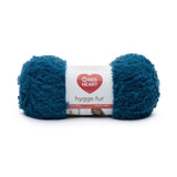 Ball of Red Heart Hygge Fur textured yarn in peacock (deep turquoise)