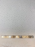 Flat swatch silver foil stars printed fabric on white