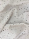 Crinkled swatch silver foil stars printed fabric on white