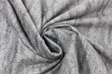 Swirled swatch dark grey knit fabric (dark grey knit look fabric with subtle black accents)