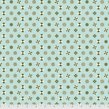 Flat swatch Peppermint Stars Green fabric (pale green mint fabric with tossed white and green circular candy mints and green stars allover)
