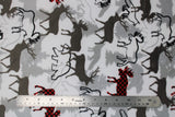 Flat swatch forest park fabric (white fabric with layered moose, bear, tree, and fox outlines and silhouettes in grey, black, and red/black buffalo check)