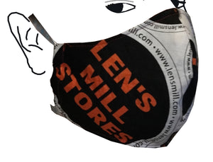 A filter-pocket shaped face mask that covers nose to chin.  The mask features Lens Mill Stores logo printed fabric, and line-drawn features (eyes and ear) provide shape and size context.