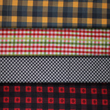 Group swatch assorted plaid fabrics in various colours