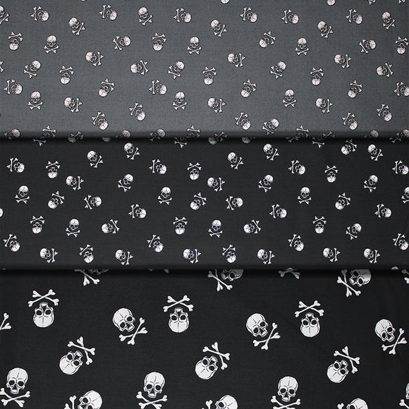 Group swatch skull and crossbone printed fabrics in various colours and styles