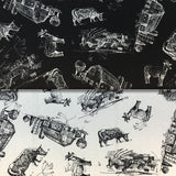 Group swatch of cow and goat barn printed fabric in black and white