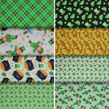 Group swatch assorted St. Patrick's Day themed fabrics in various styles