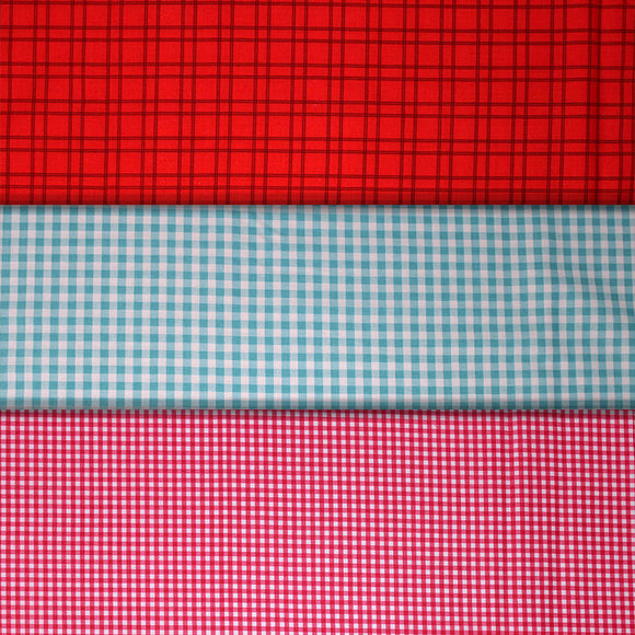 Group swatch gingham and plaid printed fabrics in various styles