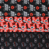 Group swatch assorted Cruella De Vil themed fabrics in various styles/colours