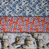 Group swatch assorted woodland themed fabrics in various prints