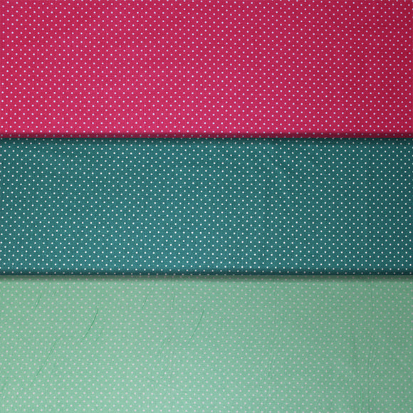Group swatch swiss dot printed fabric in various colours