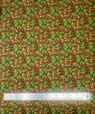 Pine fabric swatch (green fabric with busy tossed holly leaves and berries allover in red and green)