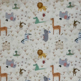 Square swatch Coco's Wildlife fabric (beige fabric with small tossed full colour cartoon zoo animals and tossed footprints, plant sprigs)