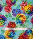 Flat swatch Large fabric (pale teal fabric with brightly coloured rainbow roses tossed allover with green leaves)