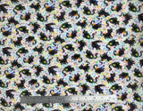 Flat swatch Nick fabric (white fabric with tossed cartoon black cats allover with splattered rainbow coloured paint look allover)