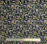 Square swatch At Home fabric (black fabric with white home related writing allover in various styles/fonts: "Home Sweet Home" "Happy home" etc. with small tossed yellow, pink and purple floral heads and dots)