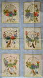 Full panel swatch - Dream Catcher Panel (24” x 45”) (grey/blue rectangular panel with 6 beige frames rectangles with dream catcher illustrations within including greenery, flowers and feathers)
