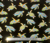 Black fabric swatch (black fabric with tossed intricately decorative turtles in various swimming poses allover)