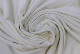 Swirled swatch Mirabella knit fabric in ivory