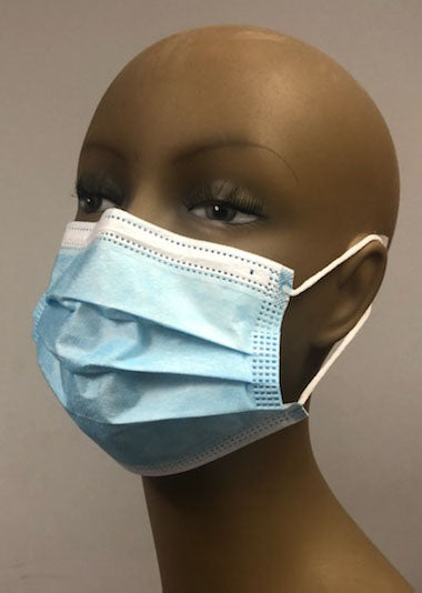 A mannequin modelling a disposable earloop style face mask