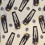 Square swatch Nightmare Before Christmas themed fabric (white fabric with Jack heads, Jack in coffin tossed)