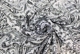 Swirled swatch Ivory/Black fabric (white fabric with black paisley/bandana print allover)