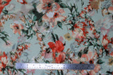 Flat swatch Sage/Melon fabric (pale green fabric with large tossed floral and greenery in white, red, green)