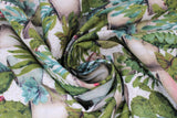 Swirled swatch Cactus Garden fabric (tightly collaged cacti plants in pots/vases)