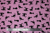 Flat swatch purrrfectly pink fabric (pink fabric with black cat silhouettes in various styles)