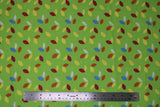 Flat swatch party lights printed fabric (bright green fabric with tossed christmas lightbulb shaped dots tossed in white, yellow, red, orange, blue)