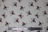 Flat swatch santa & rudolph printed fabric (white fabric with cartoon white rudolph with red nose getting rode by cartoon santa in red suit, tossed allover with faint grey reindeer tracks)