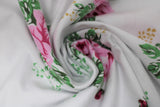 Swirled swatch rose fabric (white fabric with medium floral pattern 2 pink roses and greenery with small buds, lots of white space)