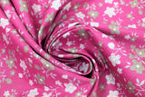 Swirled swatch Pink Floral Toss fabric (hot pink fabric with tossed pale pink and mauve floral heads and stems)