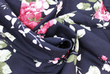 Swirled swatch Black fabric (black fabric with fabric with large tossed pink peony look floral and greenery design)