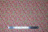 Flat swatch Pink fabric (white fabric with busy collaged tiny floral heads and leaves allover in pink shades, purple and green)
