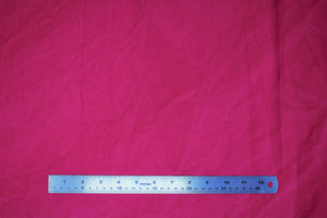 Square swatch aged look muslin cotton fabric in shade Magenta