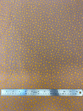 Flat swatch microprint flannel in dainty flowers on brown (yellow tiny flower heads)