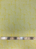 Flat swatch microprint flannel in yellow dyed (pale yellow dye marks on white)