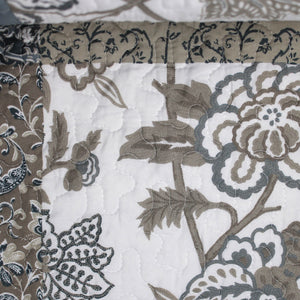 Swatch of matelasse printed fabric (grey floral)