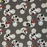 Square swatch Mickey Mouse print fabric (dark grey fabric with solid light grey mickey head outlines revealing full character)