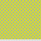 Swatch of pom pom (dots) printed fabric in myrtle (yellow/green)