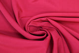 Swirled swatch solid upholstery fabric in shade Rojo (red)