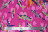 Flat swatch migration themed printed fabric in the humpbacks (medium bubblegum pink fabric with colourful humpback whales and pale white icebergs)