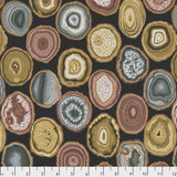 Flat swatch geodes fabric in charcoal (darkest grey fabric with organic circular rock/geode style shapes in cream, brown, rust, teal)
