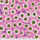 Square swatch pink fabric (purple fabric with large collaged sunflower look floral heads with duo pink tone petals and white, brown, green and yellow centers)
