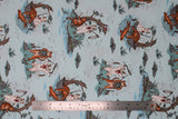 Flat swatch cat themed fabric in fishing trip (light blue fabric with tiled cat fishing trip graphics: white and tabby cat fishing in and out of canoe)